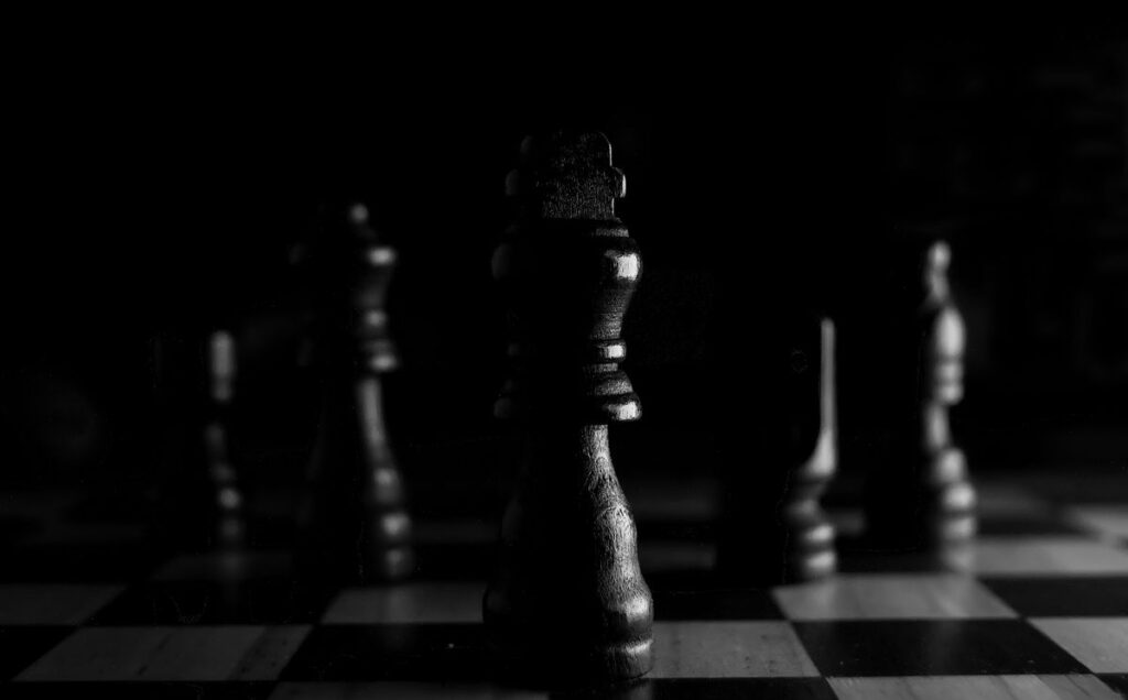 Chess queen piece highlighting Black opening strategies