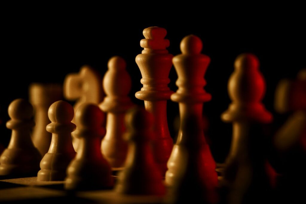 White chess pieces representing popular chess openings for White