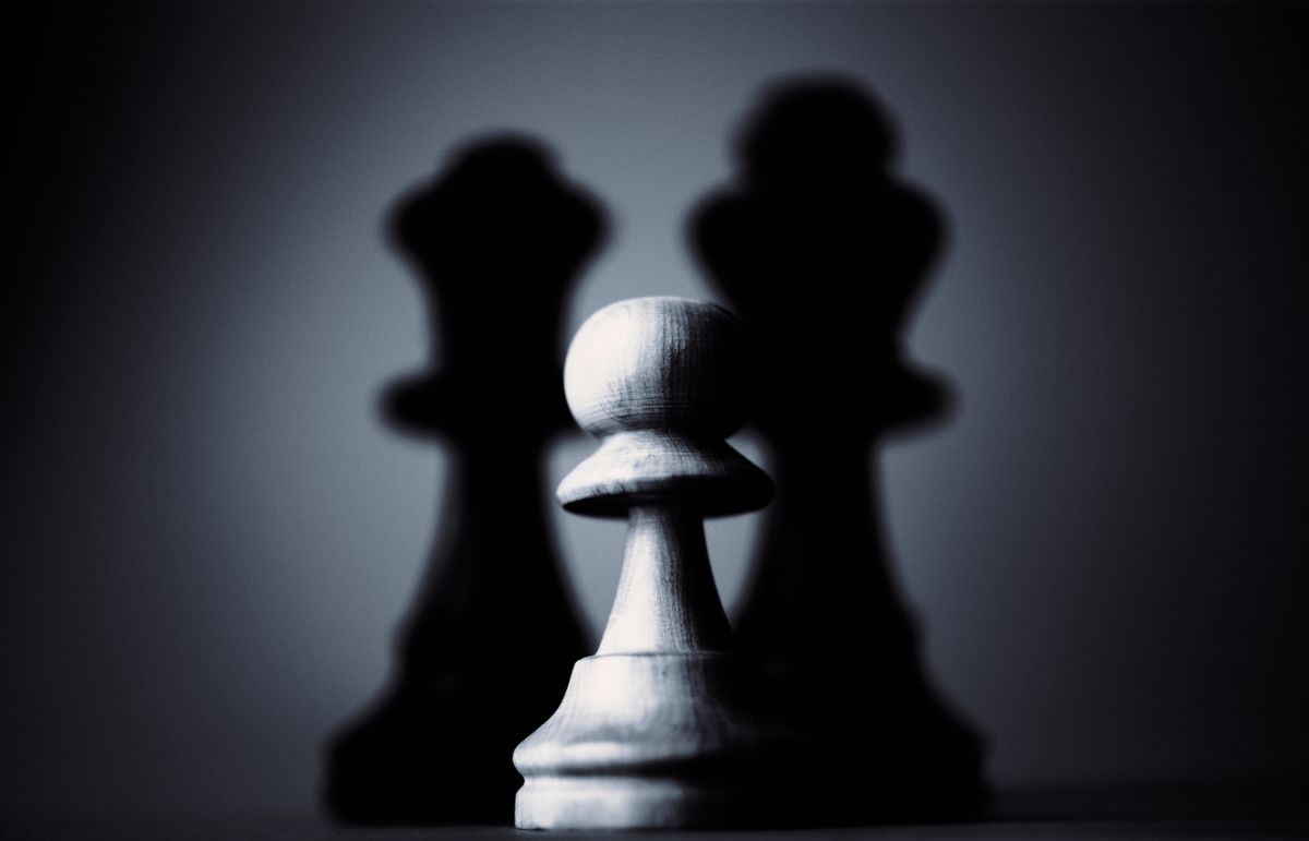 Chess pawn piece representing a gambit sacrifice in chess