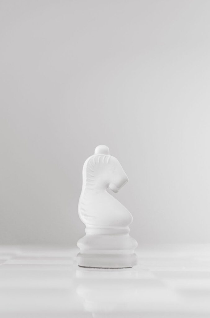 Chess knight piece representing the Stafford Gambit opening