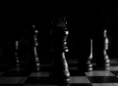 Chess queen piece highlighting Black opening strategies